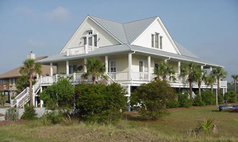 one story house with wrap around porch